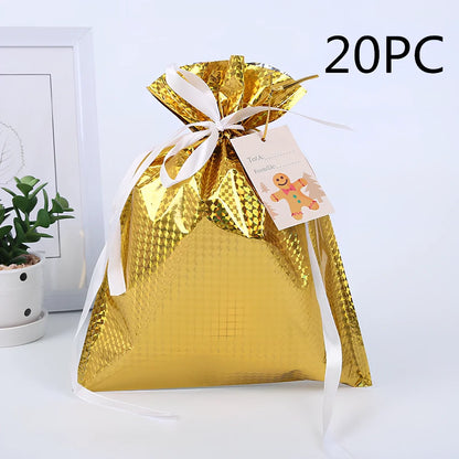 Christmas gift bag with drawstring closure in laser gold finish, 32x24cm dimensions