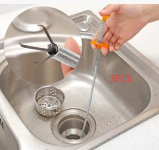 Stainless steel sewer dredge spring drain cleaning tool with a black PP handle.