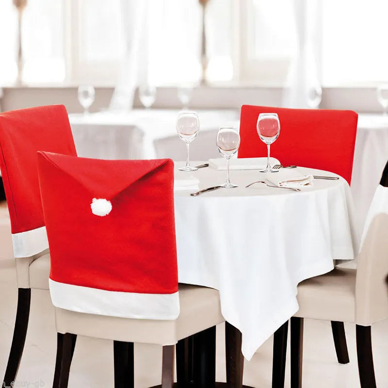 Christmas chair covers set with Santa Claus, Snowman and Santa Hat designs on dining chairs