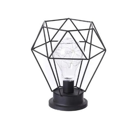 Minimalist hollow iron table lamp with warm white LED light in red wine glass design
