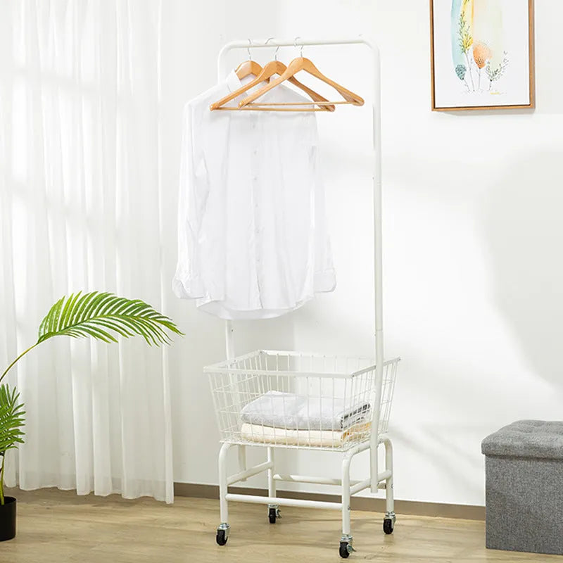 White mobile clothes storage rack with swivel casters and a single long hanging rod for shirts and trousers.