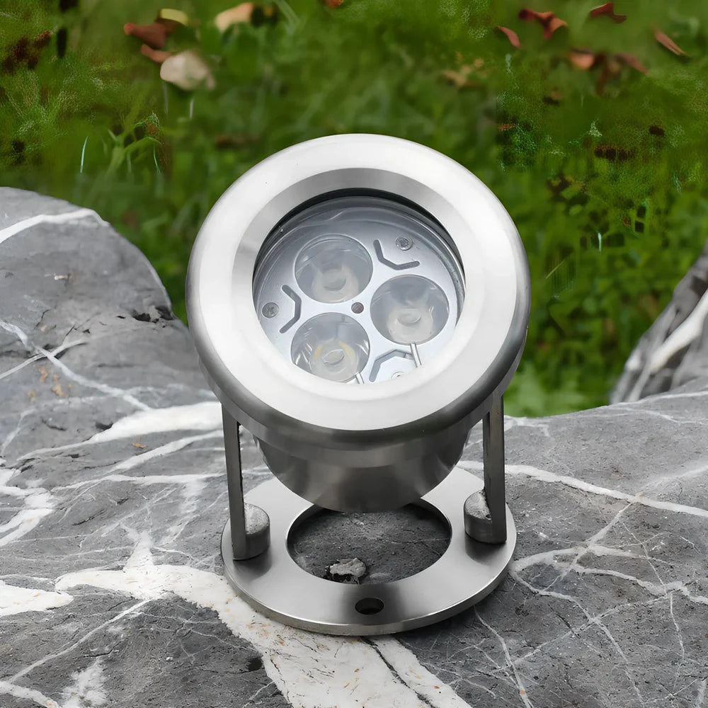 Silver LED underwater spotlights with 3 lamp beads showing 30-degree beam angle illumination in pool water