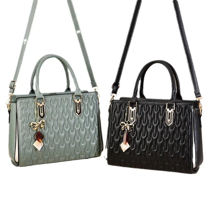 Women's shoulder messenger bag in dark blue with outer pocket sandwich design and adjustable strap