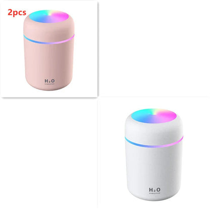Compact and Quiet Bedroom Mist Humidifier with Soothing Mood Lighting in White, Navy Blue, and Pink Colors
