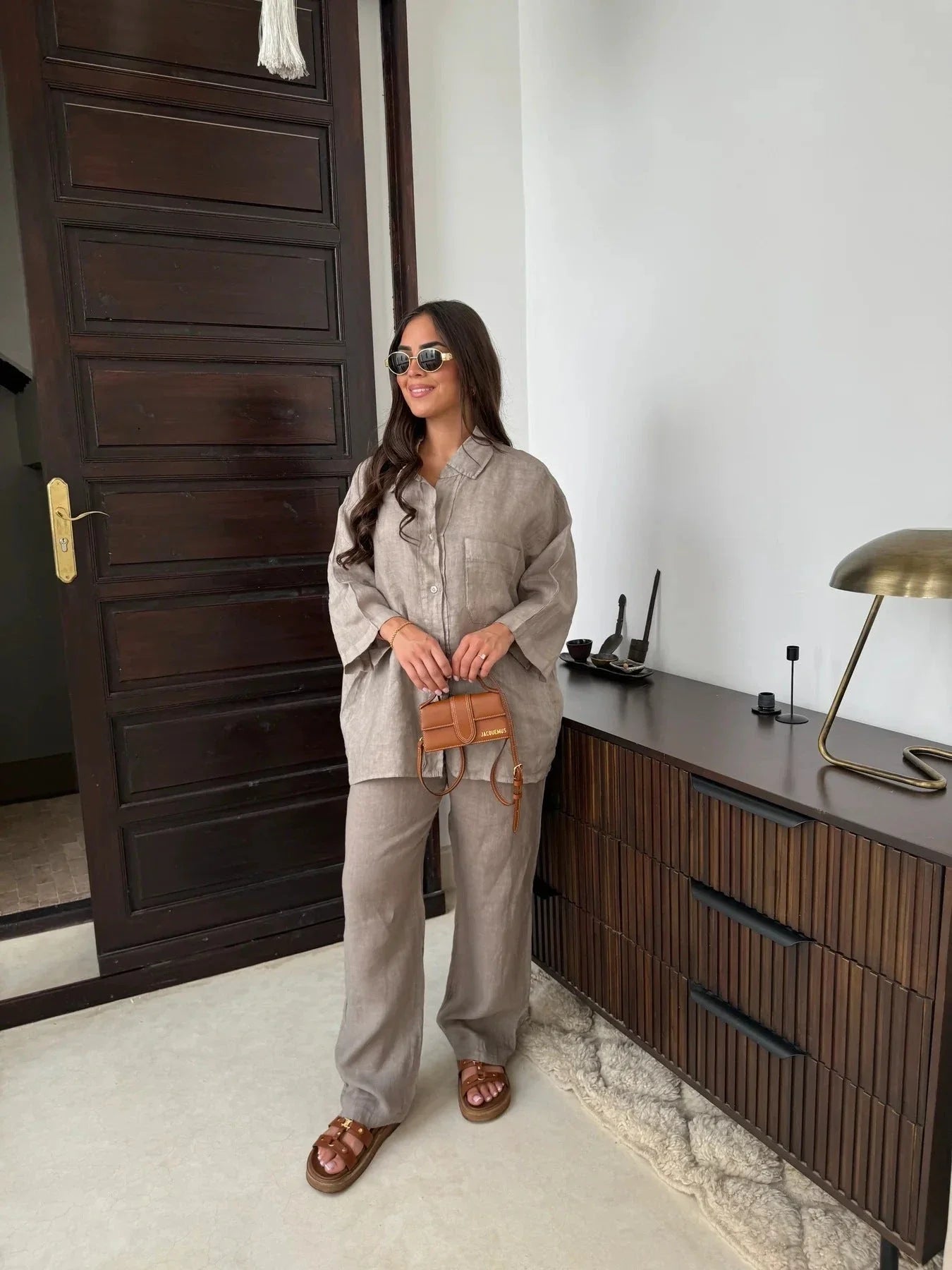 Women's stylish polyester lounge set with wide-leg pants and long-sleeved shirt in various colors