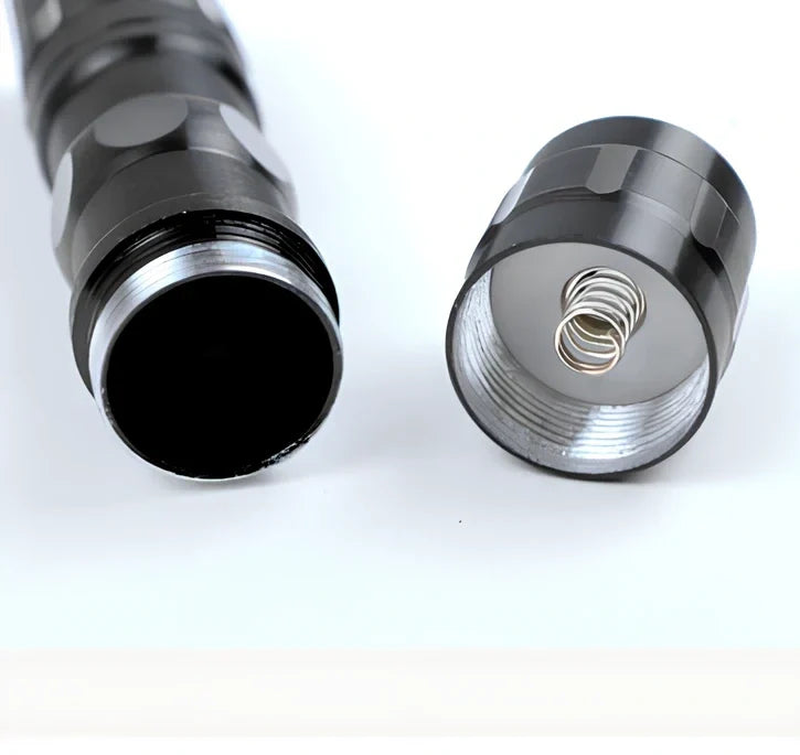 Compact black aluminum LED mini flashlight with 100-200m beam, 9.5cm long for portable use