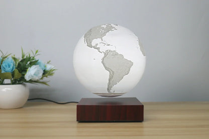 Levitating Earth or Jupiter lamp floating above base with LED illumination