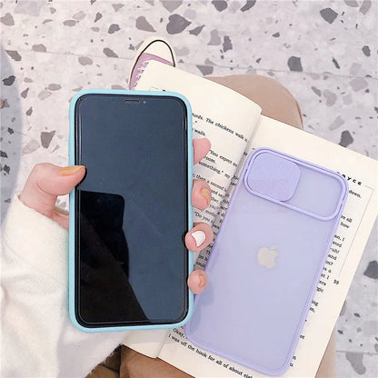 Slim silicone iPhone case with a frosted frame around the camera lens, shown in a choice of solid colours.