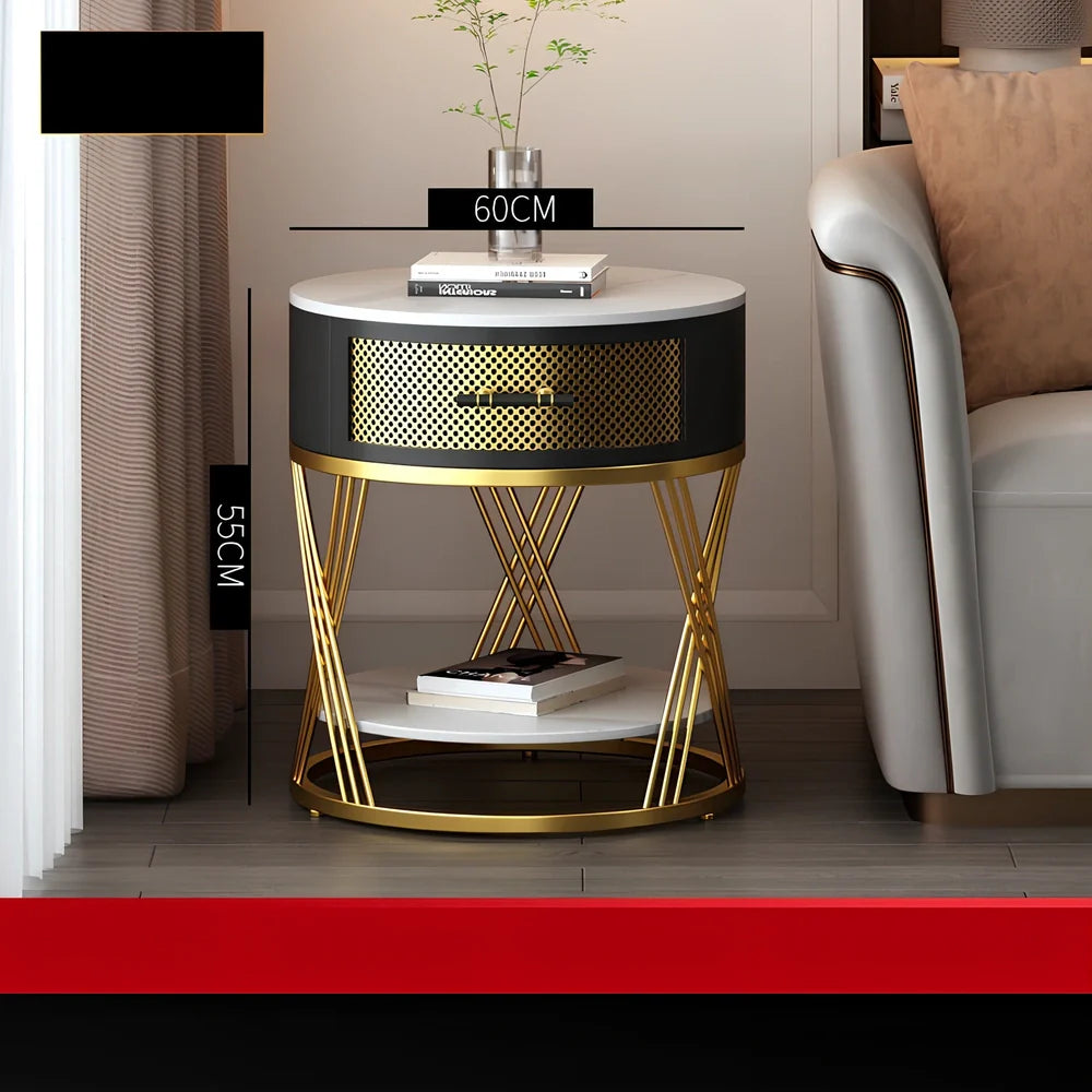 Round coffee table with slate surface and metal frame, featuring integrated storage compartment