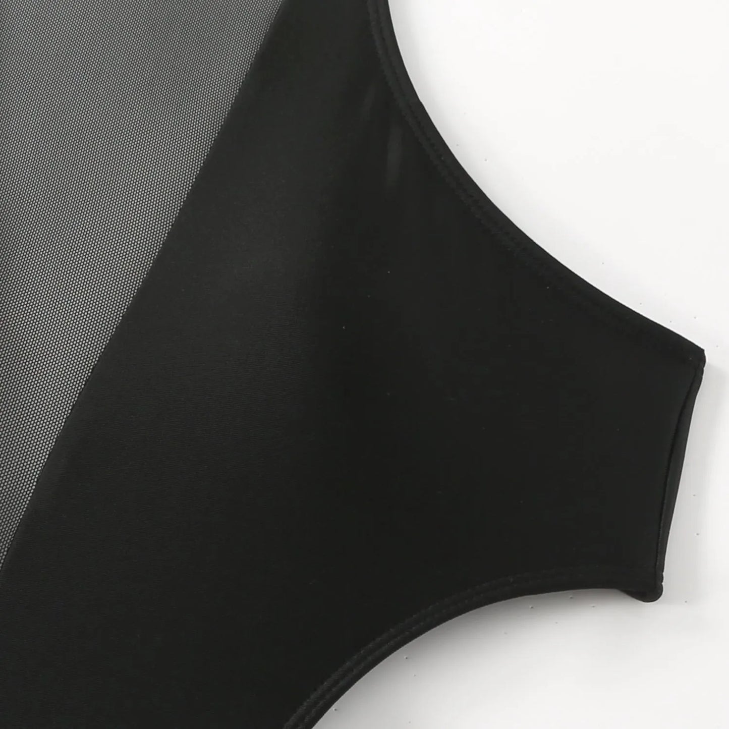 Black women's one-piece swimsuit showing nude back and hollow-out strap design.