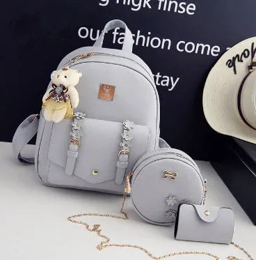 Women's PU leather 3-piece bag set showing backpack, shoulder bag, and card purse in a choice of colours.