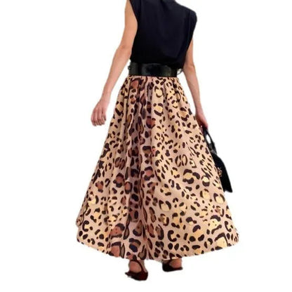 Brown leopard print A-line long skirt with 120cm hem, made from 100% polyester fabric, shown in sizes S to XL.