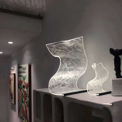 USB-powered bedside lamp with three-colour light adjustment in Nordic design