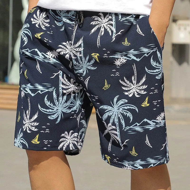 Man wearing loose-fitting striped beach pants made from quick-dry ice silk fabric.