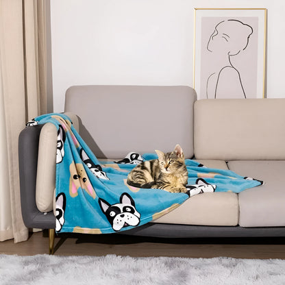 Blue dog cartoon print double-sided flannel pet blanket shown in a dog crate.
