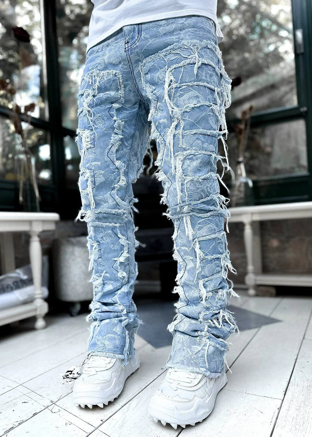 Stylish patched men's jeans with tight, stacked fit and variety of vibrant color options
