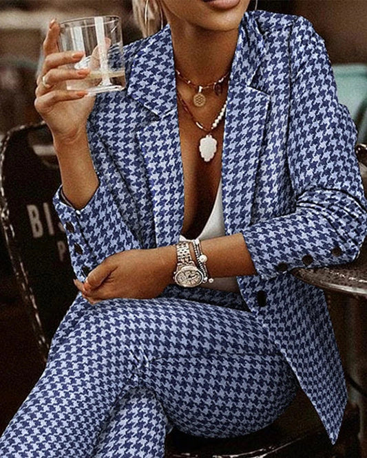 Women's plaid blazer and slim-fit pant set in black and white, and blue colors