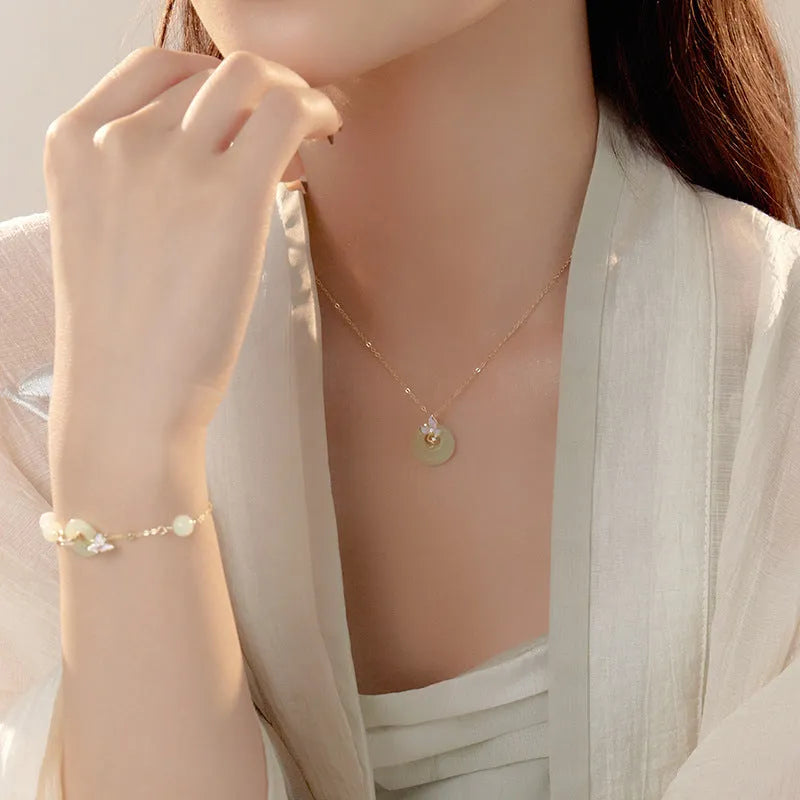 Sterling silver necklace with orchid pendant and safety buckle closure