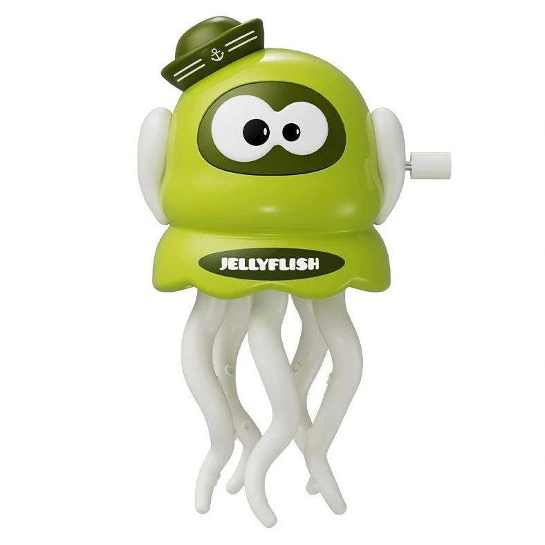 Green wind-up octopus toy dancing on surface with clockwork mechanism visible