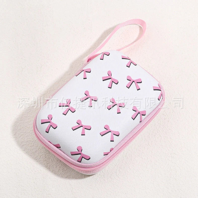 Square hard shell EVA cable storage bag with zipper, 11x8x4cm dimensions, showing Bunny Plaid design variant