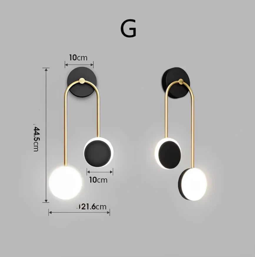 Nordic wall lamp with black gold finish and LED lighting, mounted beside bed with dimming controls