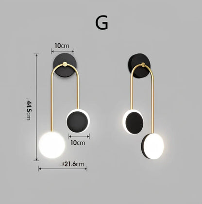 Nordic wall lamp with black gold finish and LED lighting, mounted beside bed with dimming controls