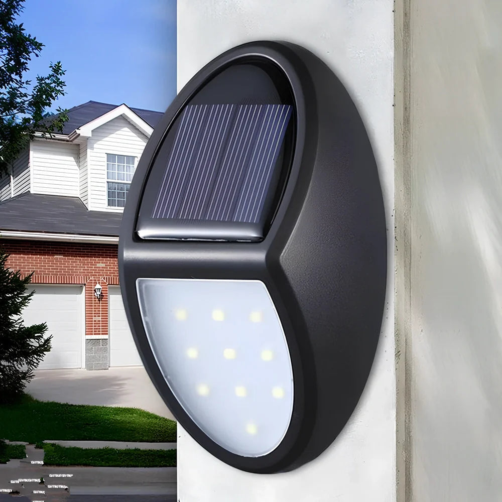 Black LED solar wall light with solar panel and 2835 lamp beads for outdoor illumination
