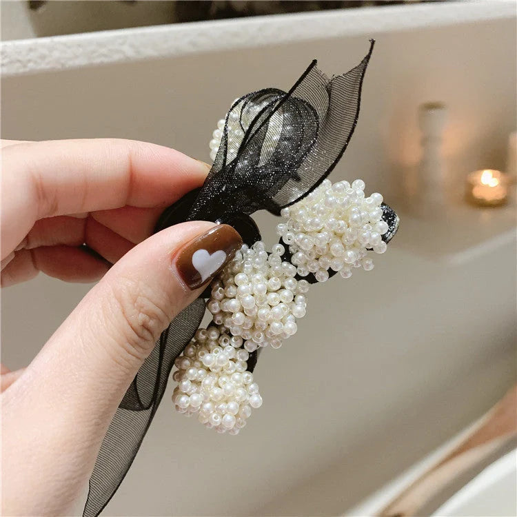 Korean pearl bow hair clip with alloy construction and handmade design
