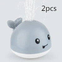 Electric induction whale spray toy for baby bath time with lights and music