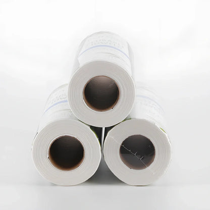 Roll of reusable bamboo paper towels showing thick fibre texture and sustainable packaging