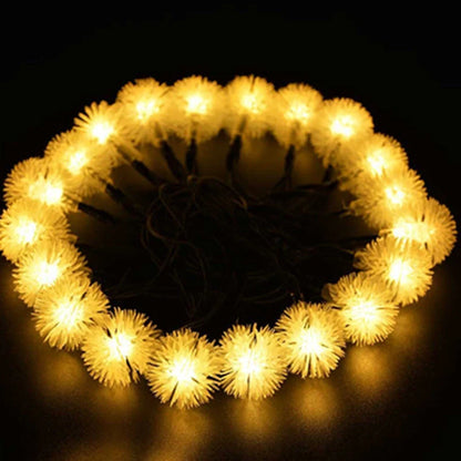 20 LED solar string lights with colourful bulbs along 5m dark green wire, solar panel, and remote control