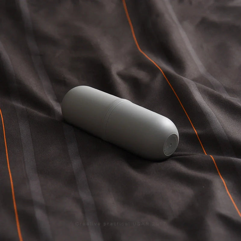 Capsule-shaped travel bottle in various colors with leak-proof design for outdoor use