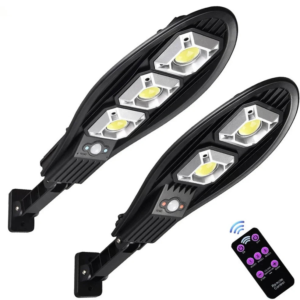 Solar street LED light with 55cm housing, white illumination, and remote control for outdoor garden security