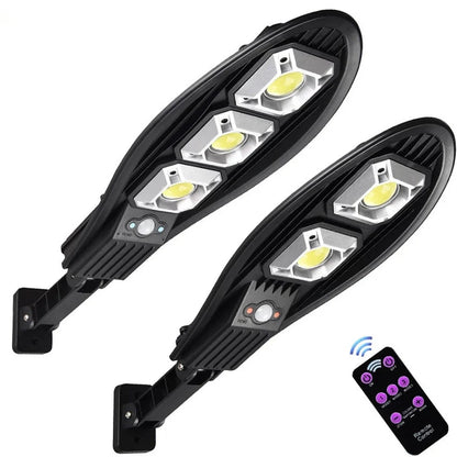 Solar street LED light with 55cm housing, white illumination, and remote control for outdoor garden security