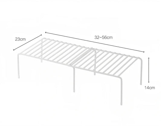 White retractable kitchen shelf extended to 60cm with spices and oils organised on metal surface