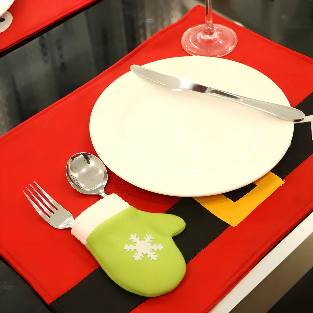 Red Christmas table mat with sewing edges measuring 45cm by 33cm for holiday dining