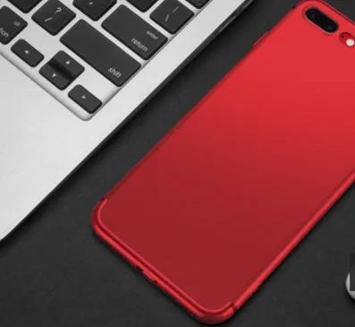 A flexible TPU silicone case for an iPhone, shown in a choice of black, blue, red, or white.