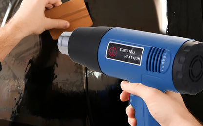 Industrial heat gun with temperature dial showing 300-500°C range, measuring 260mm long with gun mouth attachment