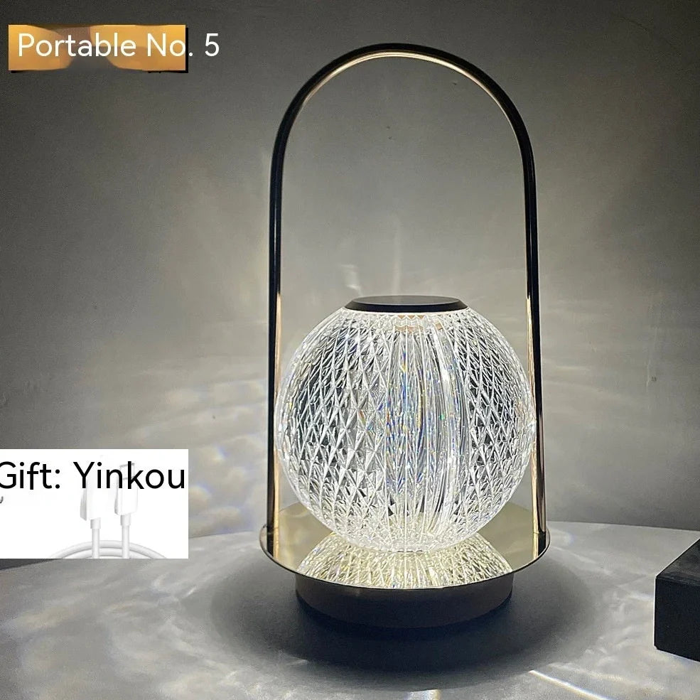 Metal portable ambience light with lantern shape measuring 11×23cm, showing touch controls and 27 colour options