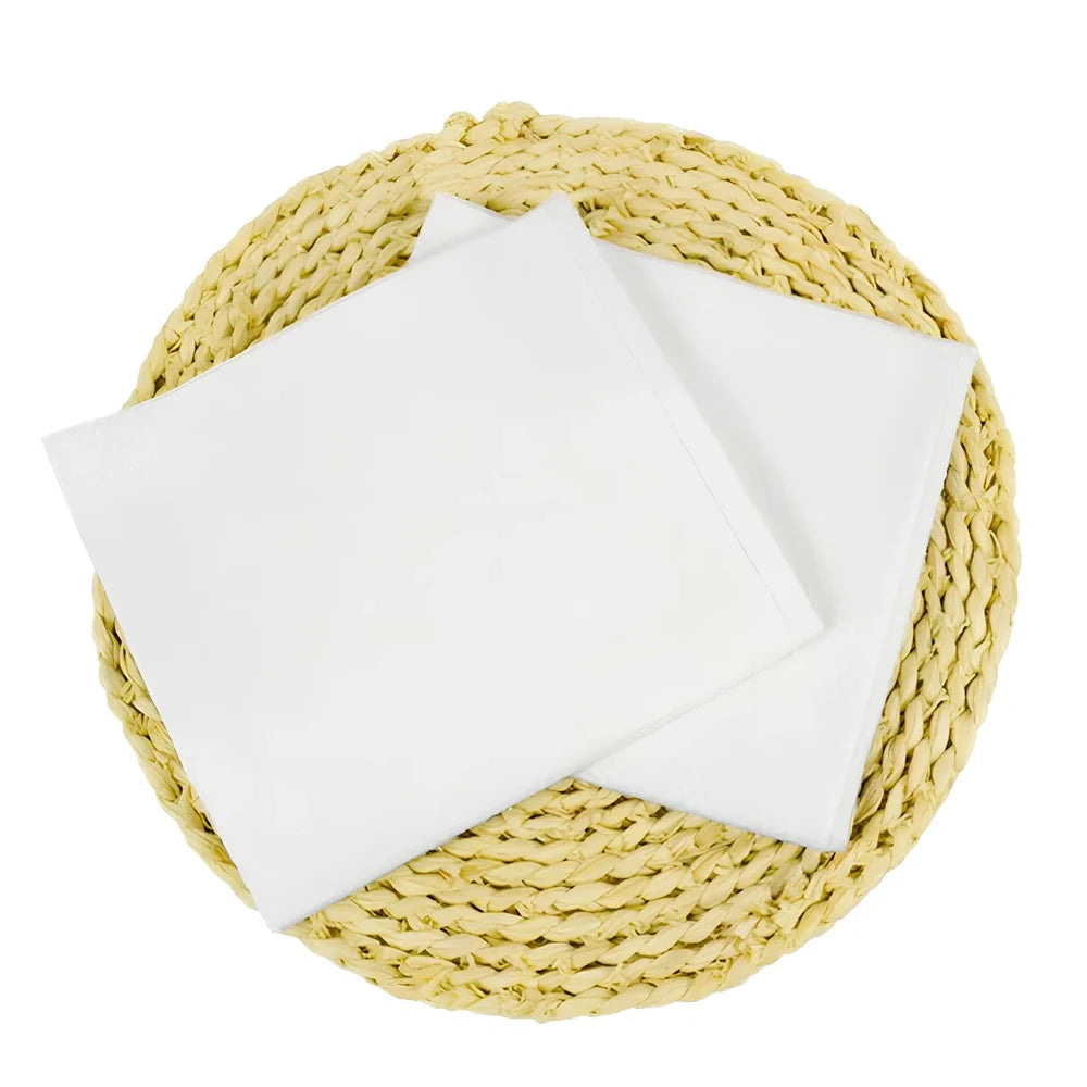 Pack of non-woven disposable bath towels 65x135cm with pearl pattern for absorbent drying