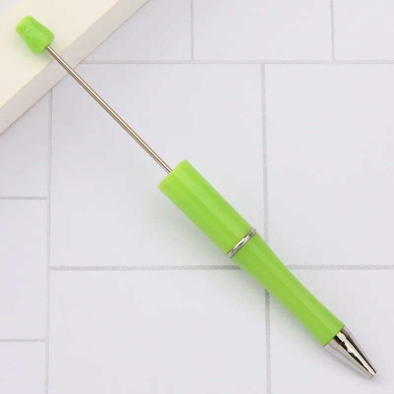 Rotating bead ballpoint pen in gradient colour with ABS plastic and steel wire construction