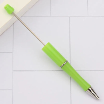 Rotating bead ballpoint pen in gradient colour with ABS plastic and steel wire construction