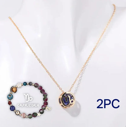Natural stone beaded necklace and bracelet set laid out flat, showing the coordinated design and textured beads.