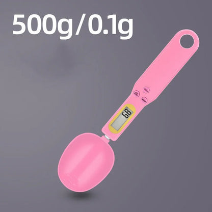 Black electronic measuring spoon scale showing digital display with spoon bowl for kitchen weighing