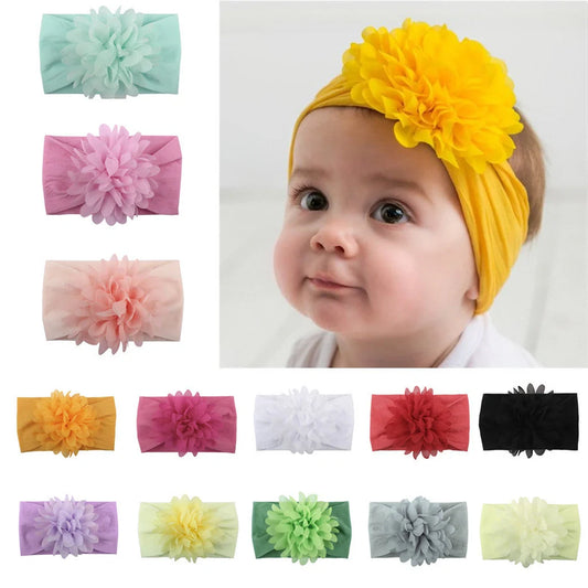 Adorable chiffon flower baby headband for your little princess, available in multiple colors.