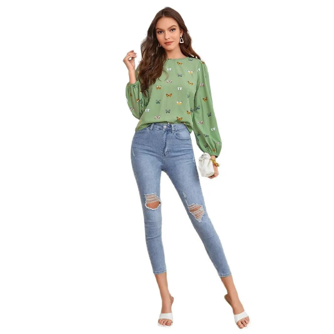 Women's loose fit long-sleeved shirt with colourful butterfly print in green colour option
