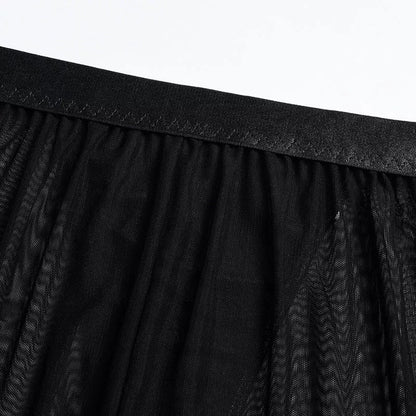 Solid black sling bikini set for women, includes bra, jacket, skirt, and shorts