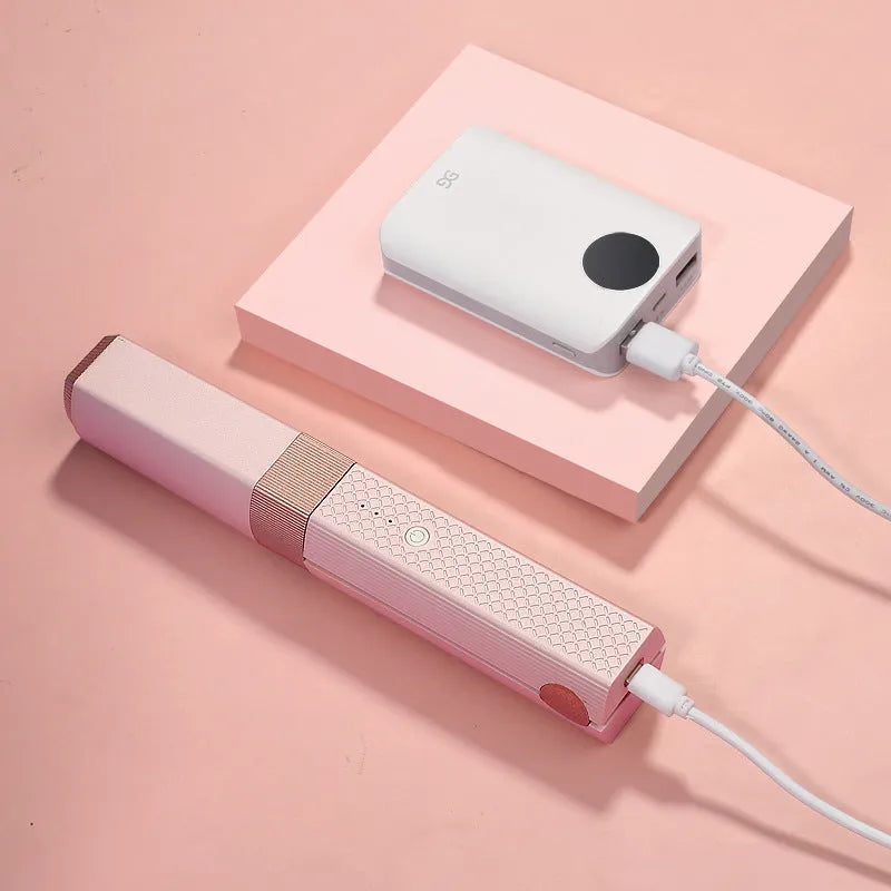 Pink and green cordless USB rechargeable mini hair straightener and curler with ceramic plates