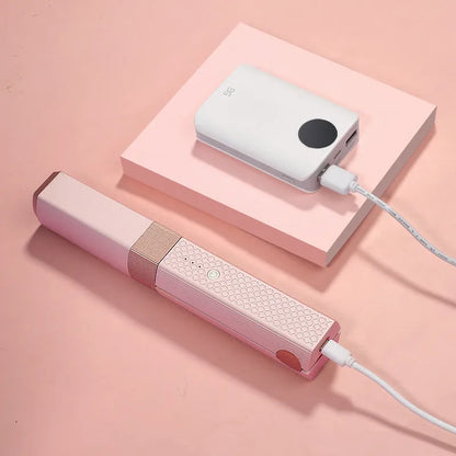 Pink and green cordless USB rechargeable mini hair straightener and curler with ceramic plates
