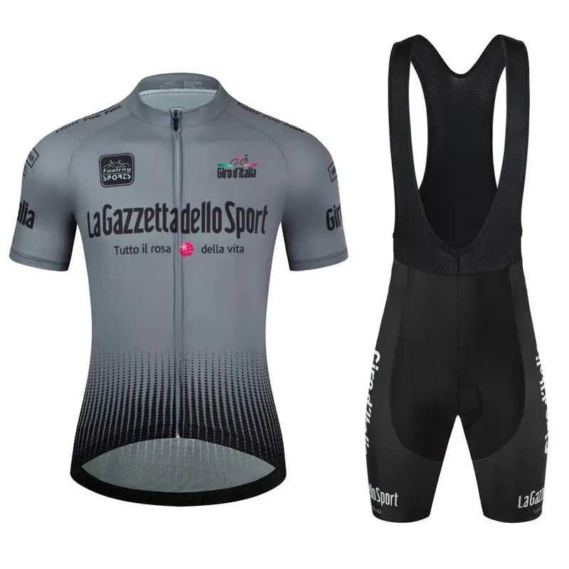 Loop short sleeve cycling suit in a patterned colour on a road bike, showing moisture-wicking fabric.